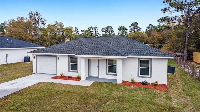 15499 SW 27th Ln, Ocala, FL 34481 - ranch-style house with roof with shingles, concrete driveway, stucco siding, and an attached garage