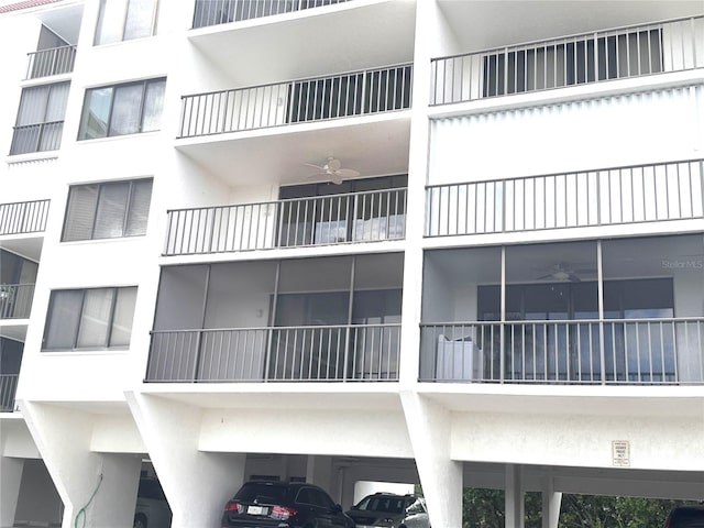 view of building exterior featuring a carport