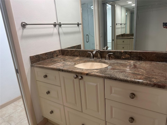 bathroom featuring vanity and tile patterned floors