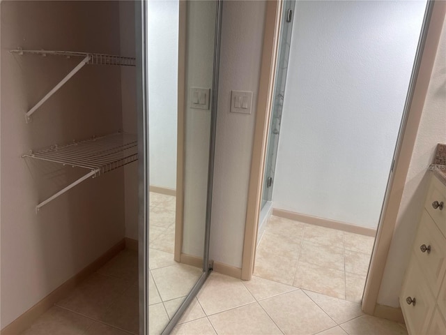 bathroom with vanity and tile patterned floors