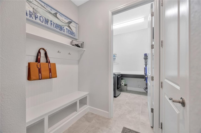 mudroom featuring light tile patterned floors