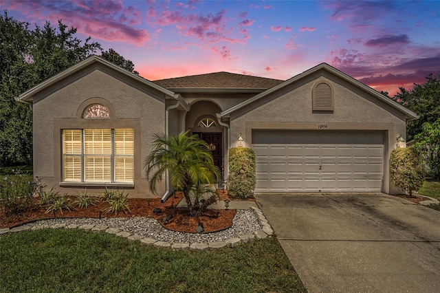 ranch-style house with a garage