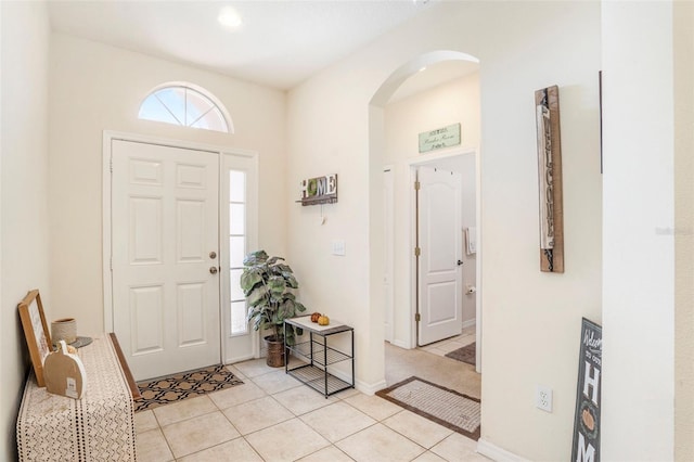 entryway featuring light tile patterned floors