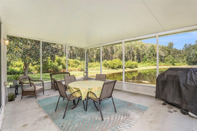 sunroom with a water view