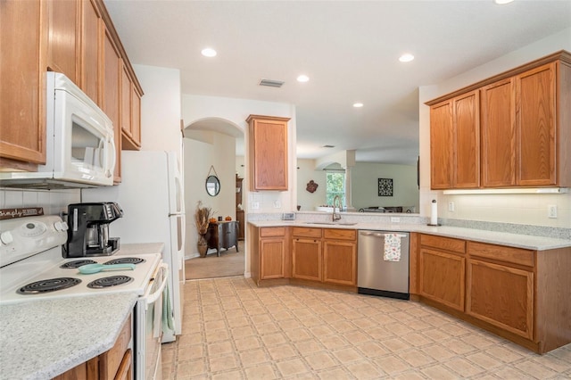 kitchen with white appliances and sink