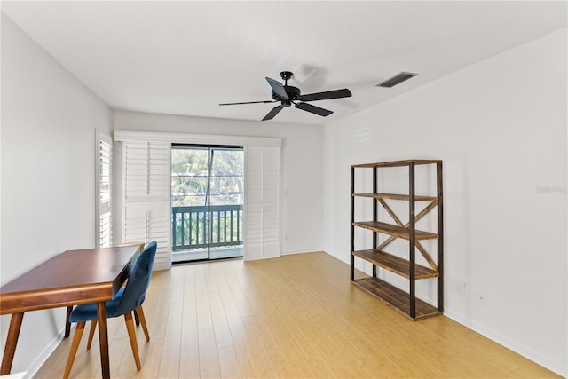 interior space with ceiling fan and light hardwood / wood-style flooring