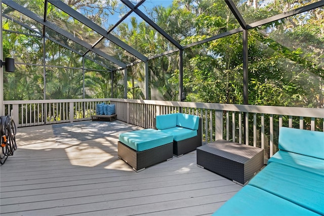 wooden deck with outdoor lounge area and a lanai