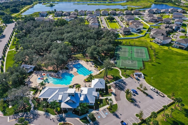 birds eye view of property featuring a water view