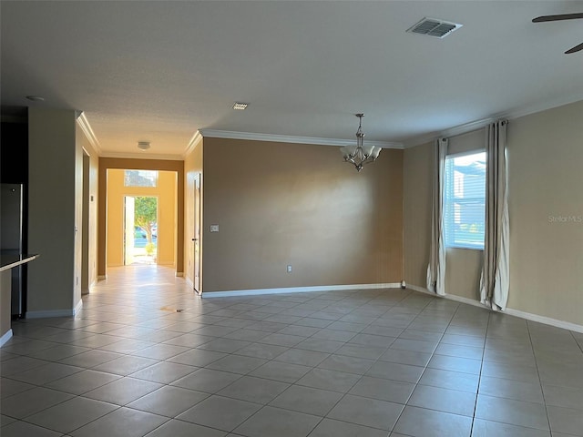 tiled empty room featuring ceiling fan with notable chandelier and ornamental molding