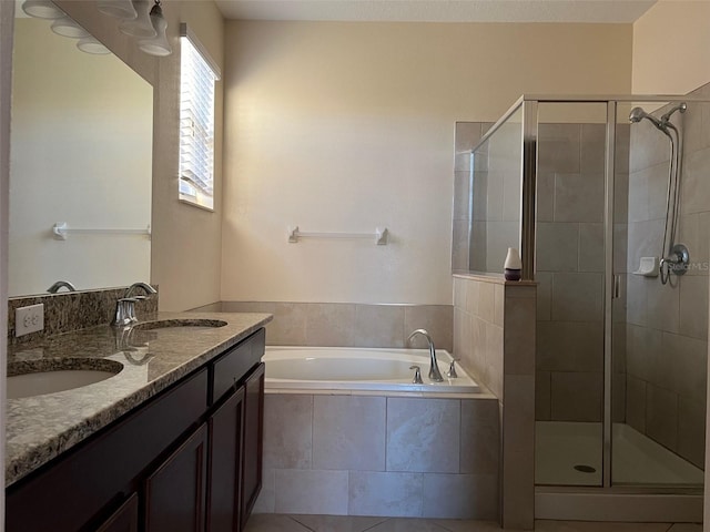 bathroom with vanity, separate shower and tub, and tile patterned flooring