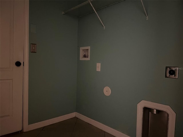 laundry area with electric dryer hookup, washer hookup, and tile patterned flooring