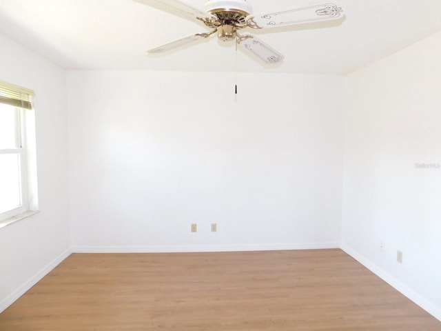 empty room featuring light hardwood / wood-style floors and ceiling fan