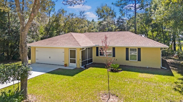 single story home with a front lawn and a garage