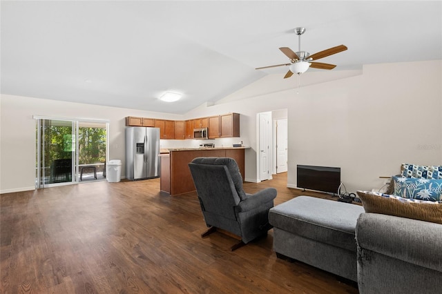 living room with lofted ceiling, dark wood-type flooring, and ceiling fan