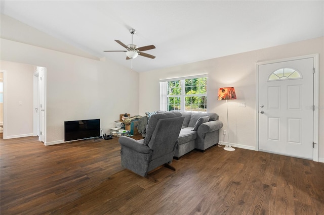 living room with lofted ceiling, ceiling fan, and dark hardwood / wood-style flooring