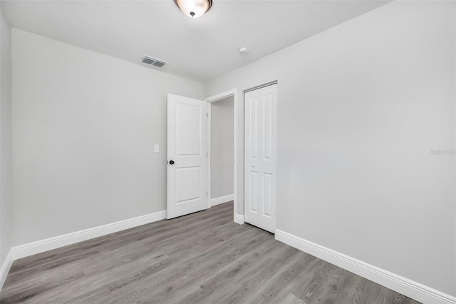 empty room with light wood-type flooring