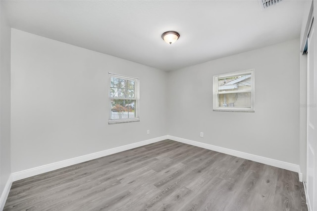 empty room with light wood-type flooring