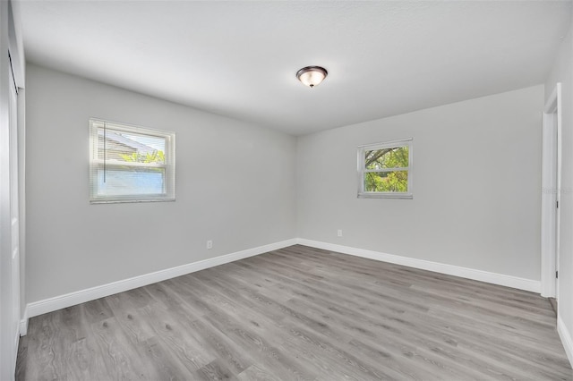 empty room with light wood-type flooring