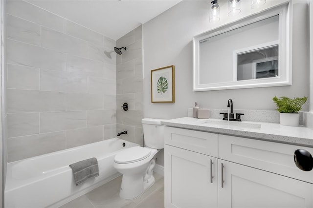 full bathroom featuring vanity, toilet, tile patterned flooring, and tiled shower / bath