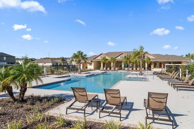 view of swimming pool with a patio area