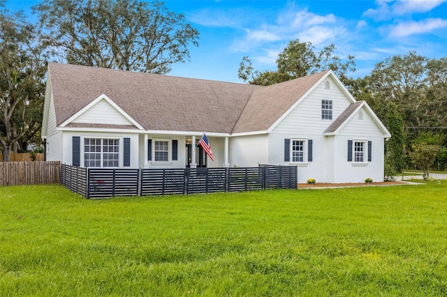 view of front facade with a front yard