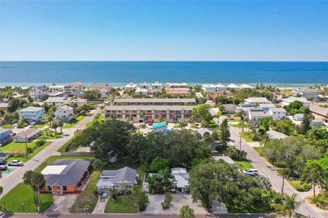 aerial perspective of suburban area featuring a nearby body of water