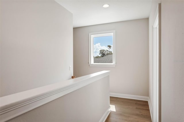 hallway featuring hardwood / wood-style flooring