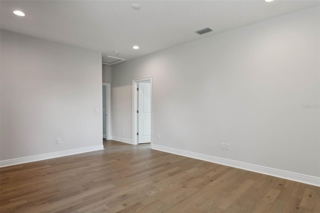 empty room with wood-type flooring