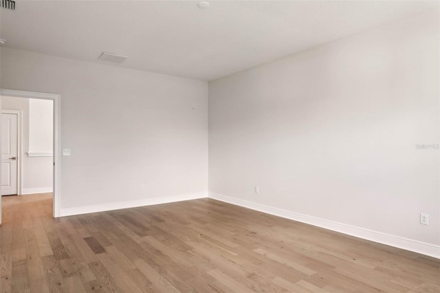 empty room featuring light hardwood / wood-style floors