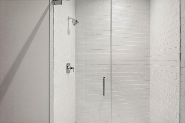 bathroom with an enclosed shower