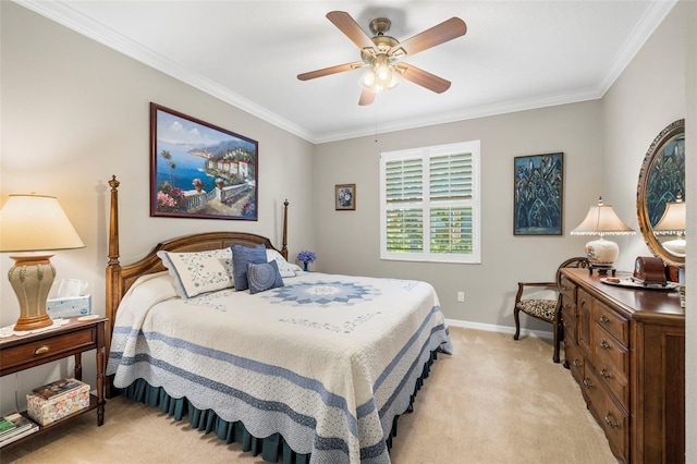 carpeted bedroom featuring ornamental molding and ceiling fan