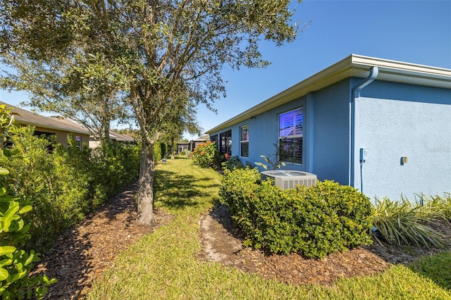 view of yard featuring central AC