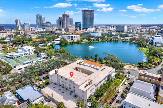 birds eye view of property featuring a water view