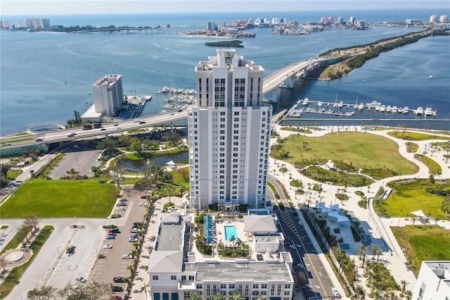 birds eye view of property with a water view