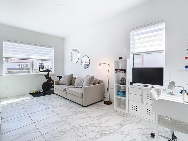 living room with a healthy amount of sunlight