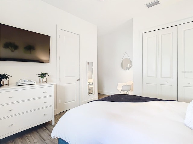 bedroom featuring light hardwood / wood-style flooring