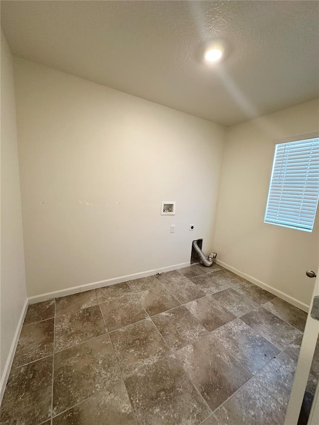 laundry area with hookup for an electric dryer and hookup for a washing machine