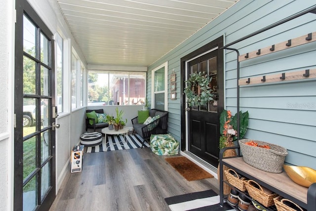 sunroom featuring a healthy amount of sunlight