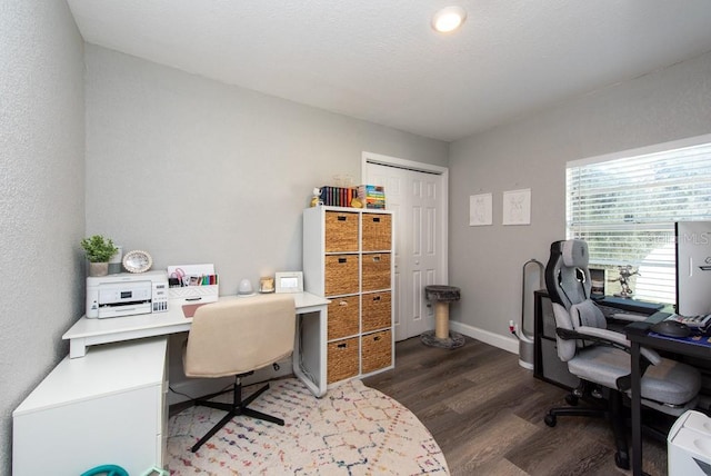 home office featuring dark wood-type flooring