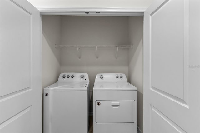 laundry room featuring washer and dryer