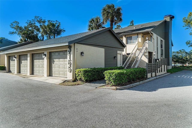 view of property exterior featuring a garage