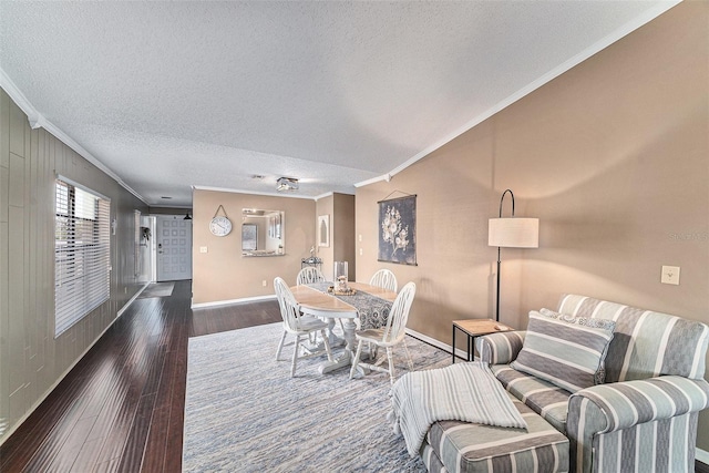 interior space with crown molding, a textured ceiling, and dark hardwood / wood-style floors