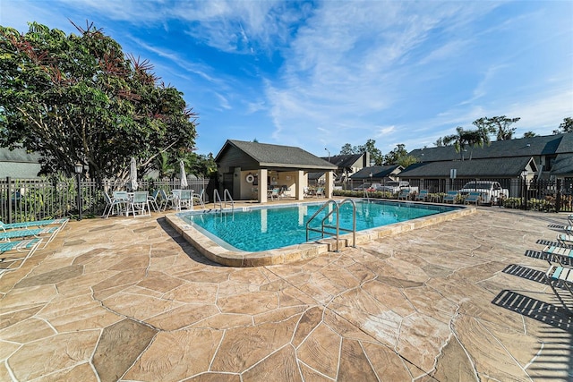 view of pool with a patio