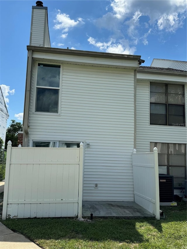 view of property exterior featuring central air condition unit