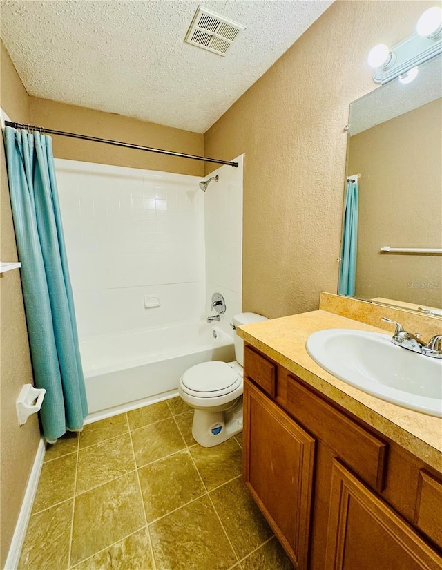 724 Haven Pl, Tarpon Springs, FL 34689 - full bath featuring a textured ceiling, vanity, a textured wall, toilet, and visible vents