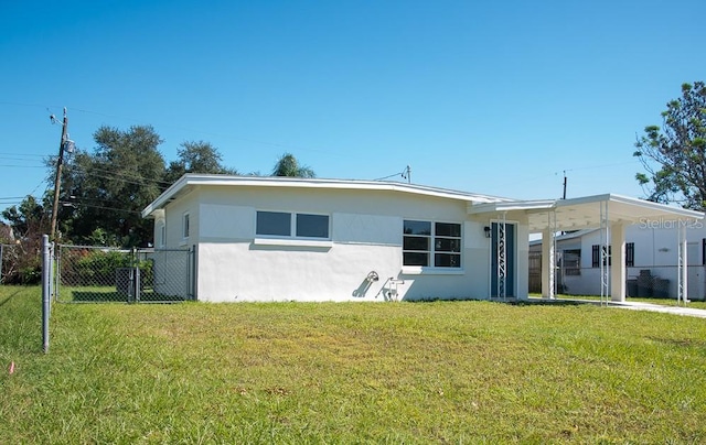 ranch-style house with a front lawn