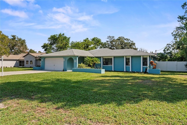 ranch-style house with a front yard and a garage