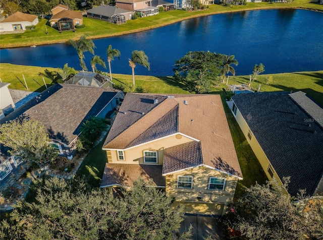 birds eye view of property featuring a water view