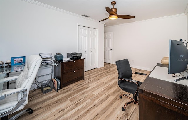 home office featuring light hardwood / wood-style flooring, ornamental molding, and ceiling fan