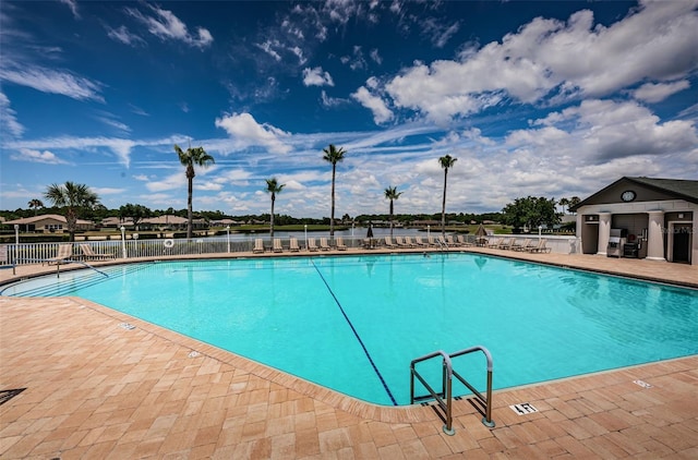 view of swimming pool featuring a patio area